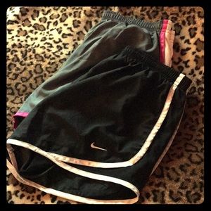 Two pairs of Nike running shorts